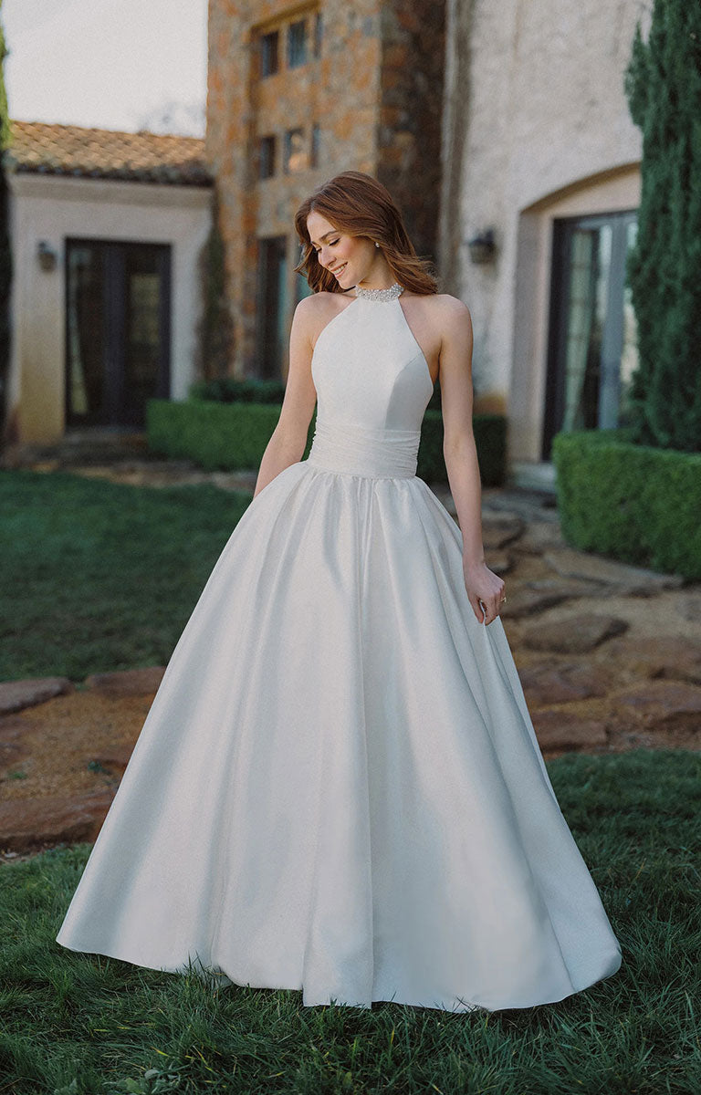 Woman wearing A1498 by Allure Bridals - Mikado Ball Gown with Beaded Halter Neckline and Pearl Detailing