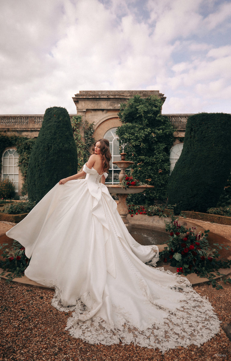 Woman wearing D362 Belle - Disney Fairytale Weddings Ivory Wedding Dress