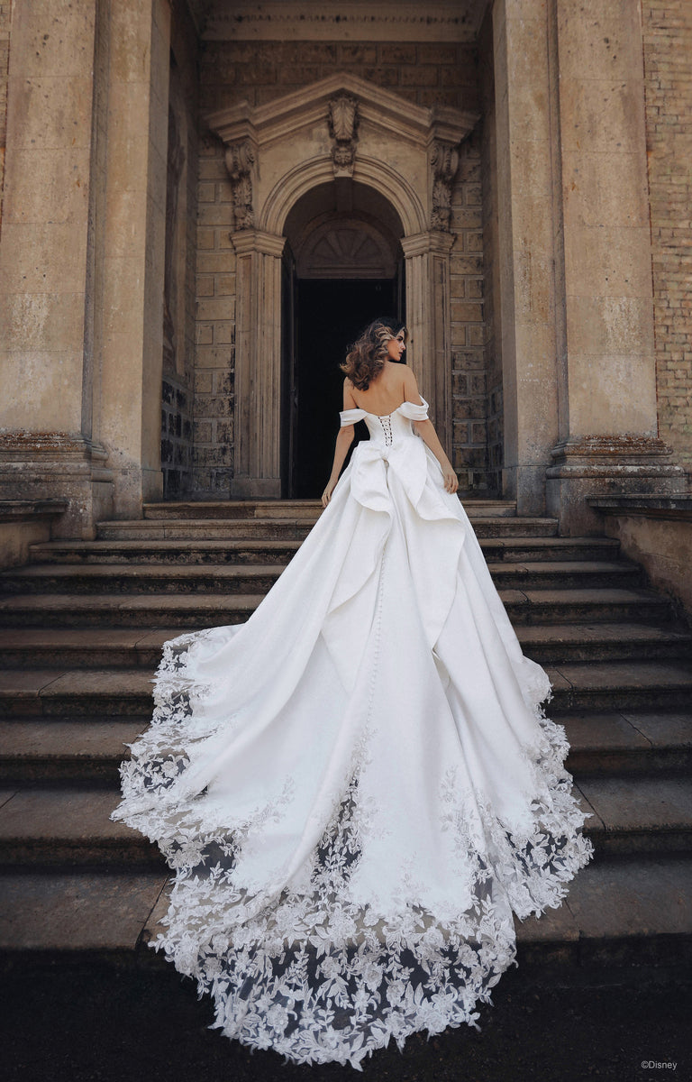 Woman wearing D362 Belle - Disney Fairytale Weddings Ivory Wedding Dress