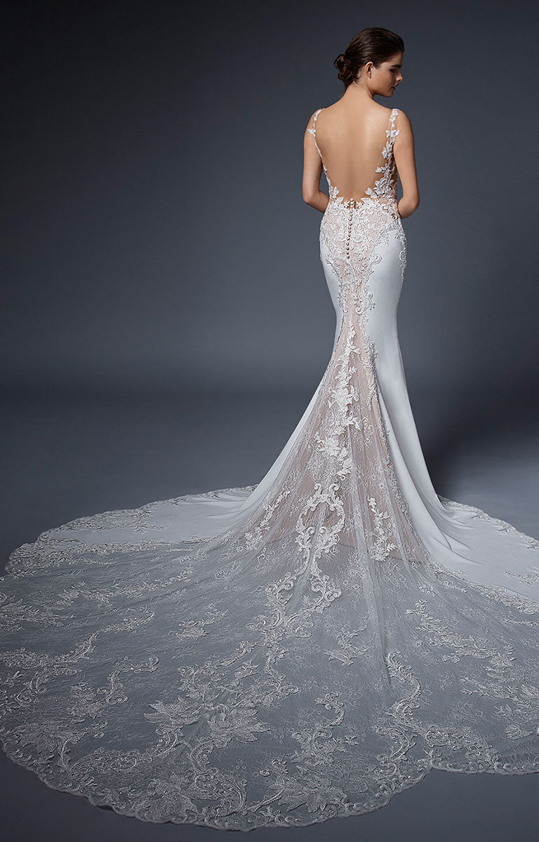 Nadiya by ÉLYSÉE - Illusion Lace Fit and Flare Wedding Dress with Beaded Train on a dark background