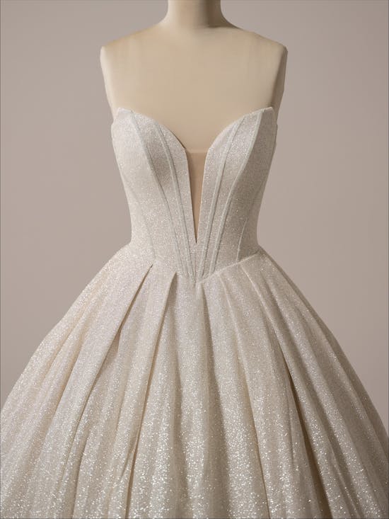 Derrick Royale by Maggie Sottero - Sparkly Champagne coloured evening gown on a mannequin against a neutral background