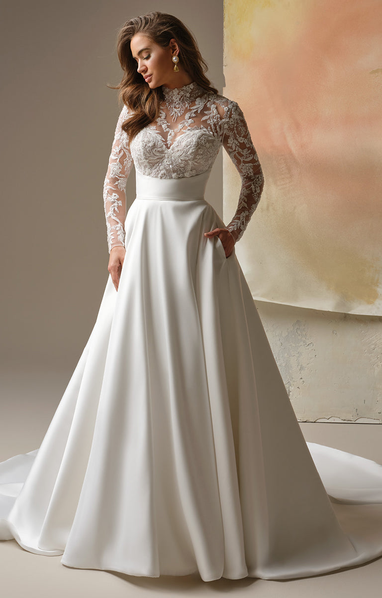 Trinity by Maggie Sottero - Regal Lace Bodice Mock Neck A-Line Wedding Dress with lace sleeves on a neutral background