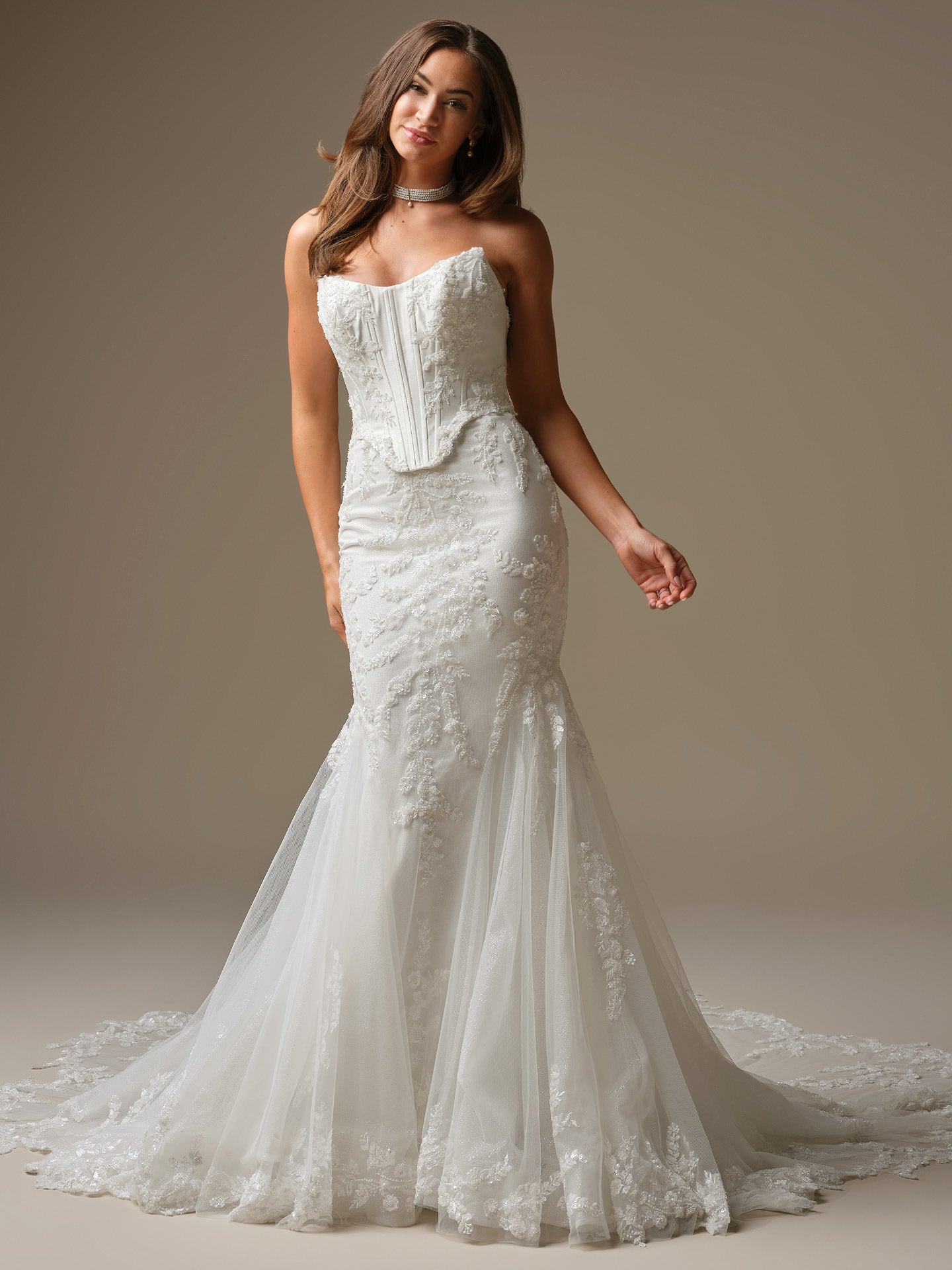 Woman wearing Wyntelle by Maggie Sottero - Fit-and-Flare Wedding Dress with Cat Eye Neckline in All Ivory against a neutral background