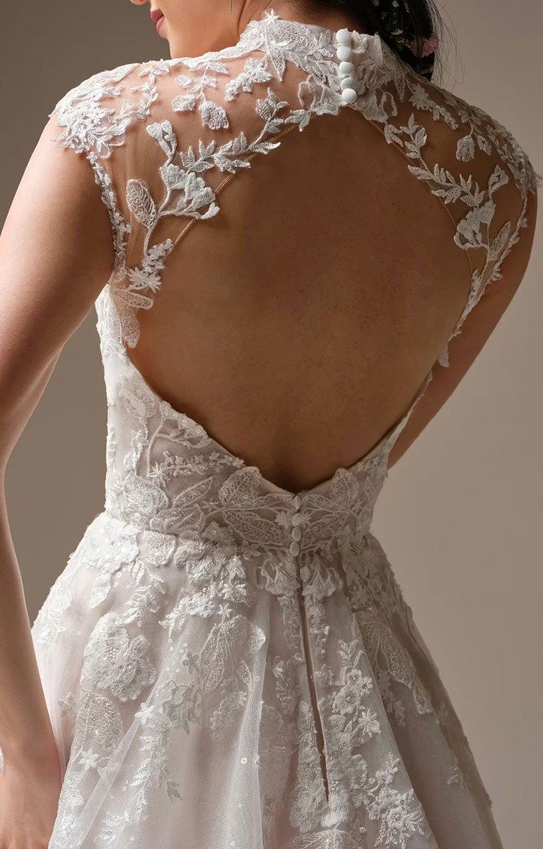 Cody by Rebecca Ingram - Illusion Neck Sequin Lace A-Line Wedding Dress with an open back on a neutral background