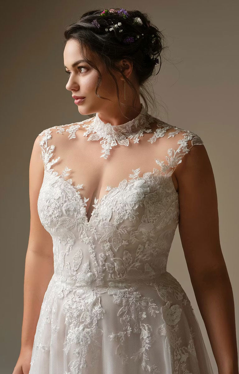 Woman wearing Cody by Rebecca Ingram - Illusion Neck Sequin Lace A-Line Wedding Dress against a neutral background