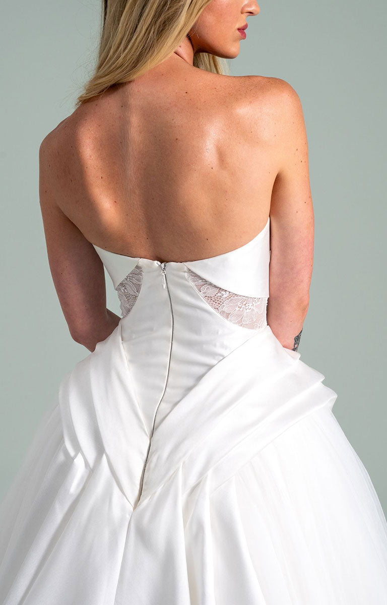 Sonnet 104 by Hayley Paige - Satin and Tulle Ballgown Wedding Dress with Draped Corset Bodice with lace detailing on a plain background